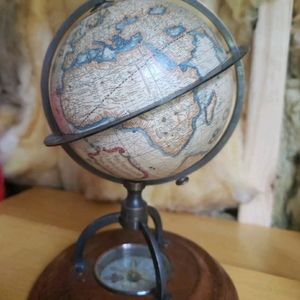 Antique vintage terrestrial world globe with compass on base collectible atlas